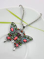 Krásný etno náhrdelník ve tvaru motýla s barevnými krystaly