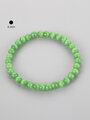 Jemný náramek z korálků barveného zeleného ulexitu kočičího oka, velikost korálků 0,6cm