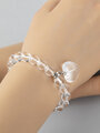 Elegantní náramek z čirého křišťálu, velikost korálků 0,8 cm, s přívěskem ve tvaru srdce