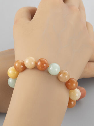 Atraktivní náramek z různobarevných korálků kalcitu, velikost kuliček 10 mm