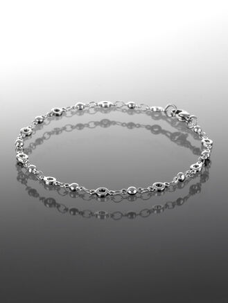 Krásný ocelový náramek s kroužky a kuličkami