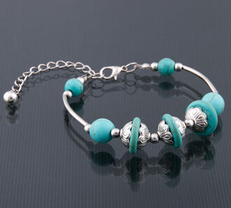 Náramek s tyrkenitovými korálky a ozdobami