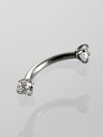 Banánek piercing do obočí s čirými krystaly z chirurgické oceli 