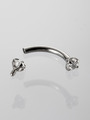 Banánek piercing do obočí s čirými krystaly z chirurgické oceli 