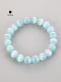 Krásný náramek z masivních korálků světle modrého ulexitu o průměru 1 cm