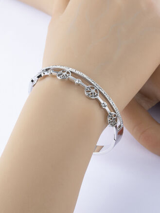 Elegantní náramek z chirurgické oceli se štrasovými kamínky a stromy života