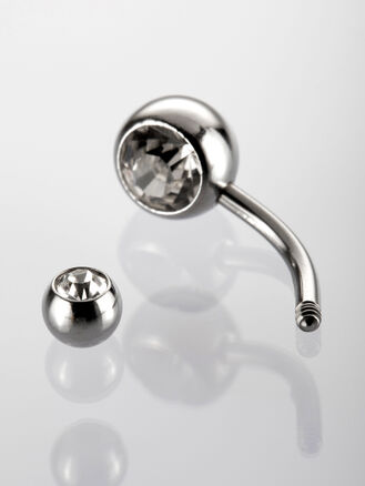 Banánek piercing do pupíku s kuličkamí s čirými krystaly 