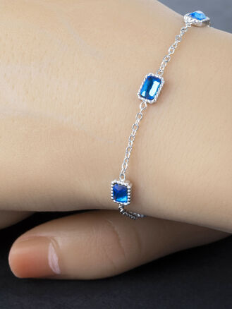 Luxusní náramek z chirurgické oceli s obdélníky s modrými krystaly 