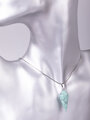 Exkluzivní amulet ve tvaru masivního kyvadla z tyrkenitu