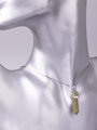 Exkluzivní amulet ve tvaru kyvadla z unakitu