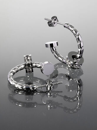 Náušnice z chirurgické oceli ve tvaru zahnutého hřebíku s čirými krystaly