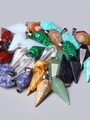 Luxusní amulet ve tvaru masivní špice z modrého slunečního kamene