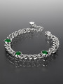 Masivní náramek z chirurgické oceli s ovály se zelenými krystaly