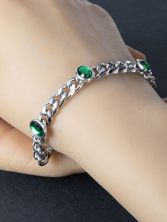 Masivní náramek z chirurgické oceli s ovály se zelenými krystaly