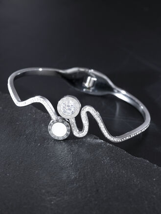 Exkluzivní elegantní pevný náramek z chirurgické oceli, vlnovka se třpytivými krystaly