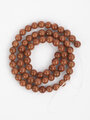 Korálková šňůra z korálků ze syntetického slunečního kamene, velikost 4 mm