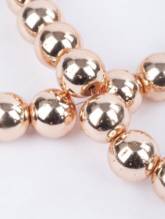 Korálková šňůra z kovově lesklých kuliček hematitu syntetického pokoveného, velikost korálků 10 mm