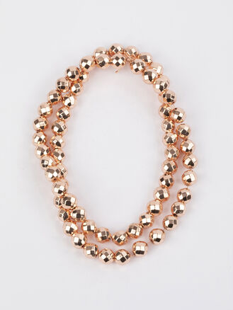 Korálková šňůra z fazetovaných kuliček hematitu syntetického pokoveného, velikost korálků  6 mm