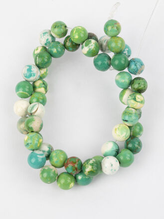 Korálková šňůra ze zelených korálků