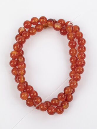 Korálková šňůra z kuliček karneolu, velikost cca 6 mm
