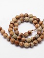Korálková šňůra z fazetovaných kuliček jaspisu obrázkového, průměr 10 mm