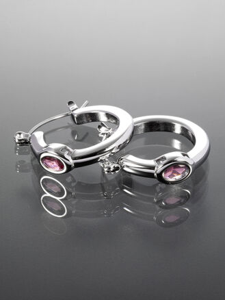 Náušnice kruhy z chirurgické oceli s oválným růžovým zirkonem