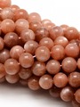 Korálková šňůra z kuliček slunečního kamene, průměr 8 mm