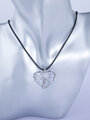 Amulet ve tvaru srdce se stromem života s kamínky křišťálu