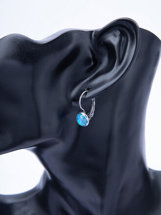 Romantické náušnice z leštěné chirurgické oceli s modrým kamínkem