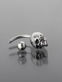 Banánek piercing do pupíku s kuličkou a lebkou z chirurgické oceli