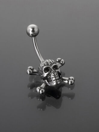 Banánek piercing do pupíku s kuličkou a lebkou s hnáty z chirurgické oceli