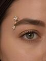 Piercing do pupíku z chirurgické oceli, zlatá a stříbrná barva kovu