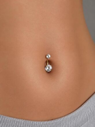 Piercing do pupíku z chirurgické oceli, kulatý s čirými krystalky, zlatá barva kovu